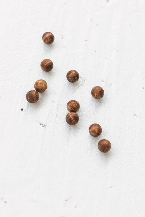 Brown wooden balls by Woodinout , Wooden Montessori toys shop