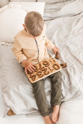 natural Wooden Numbers Puzzle. Montessori math material for Valuable family time