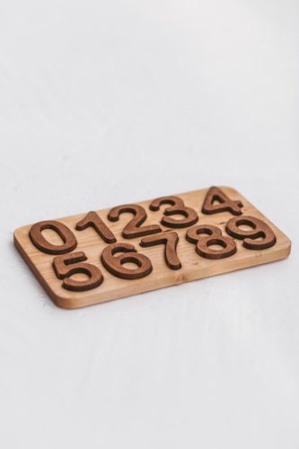 natural Wooden Numbers Puzzle. Montessori math material for Valuable family time