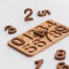 natural Wooden Numbers Puzzle. Montessori math material for Valuable family time