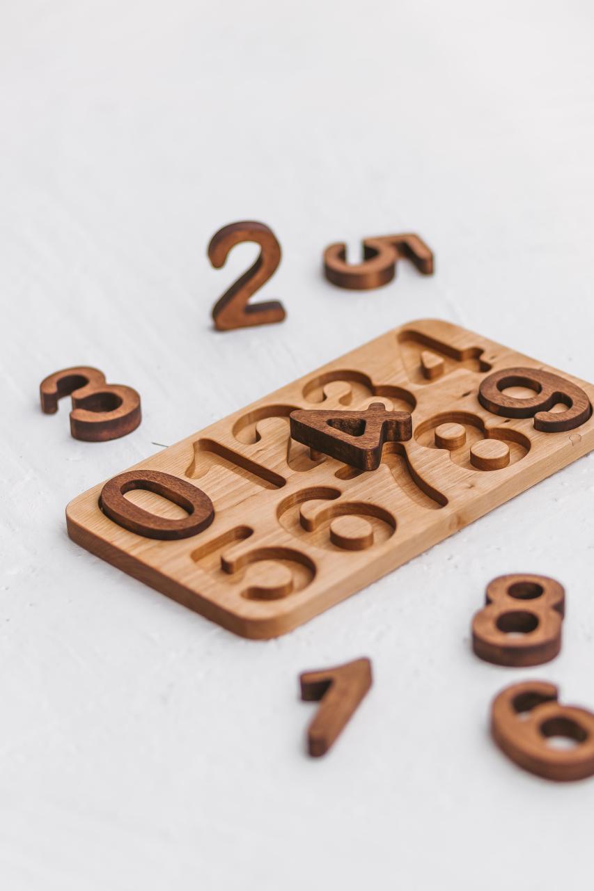 natural Wooden Numbers Puzzle. Montessori math material for Valuable family time