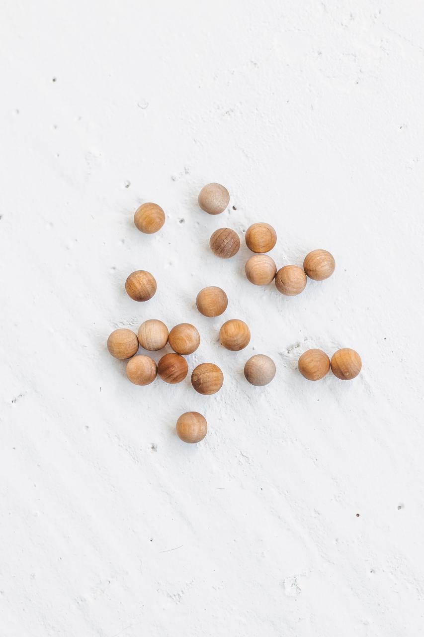 Natural wooden balls by Woodinout , Wooden Montessori toys shop